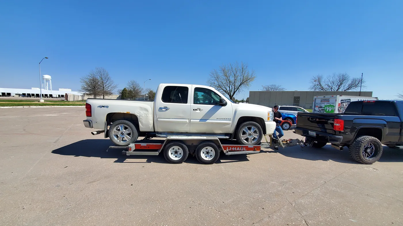 The Silverado on the trailer, the day it arrived