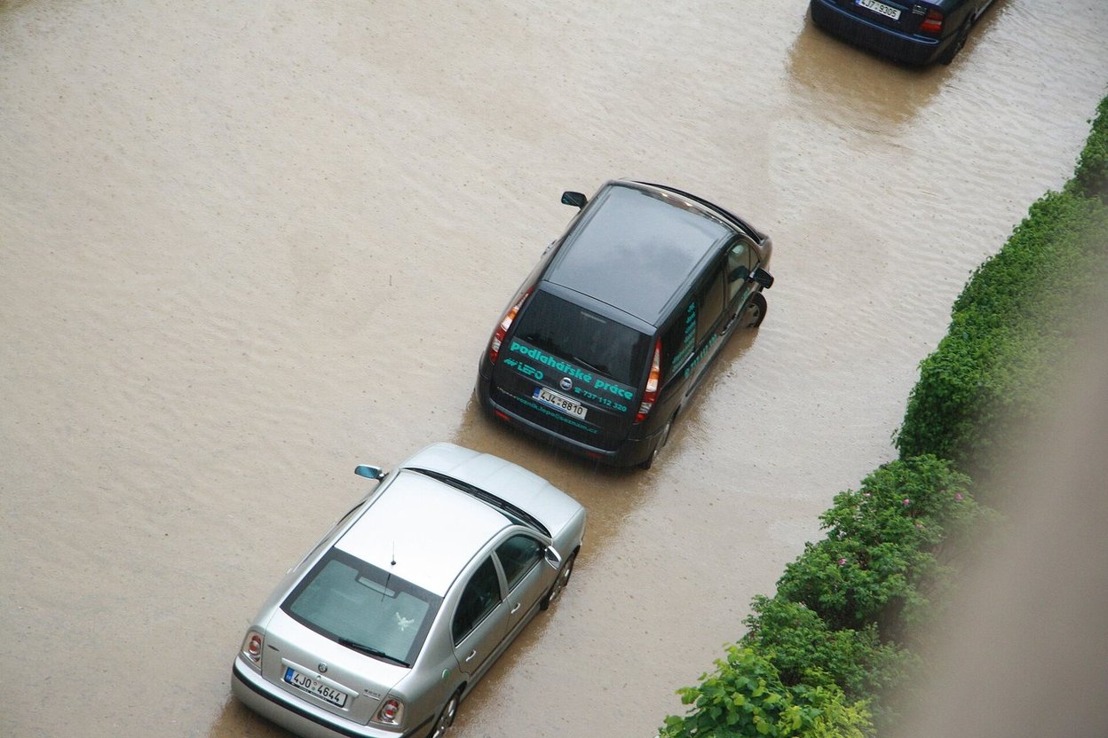 Cars sitting in floodwater