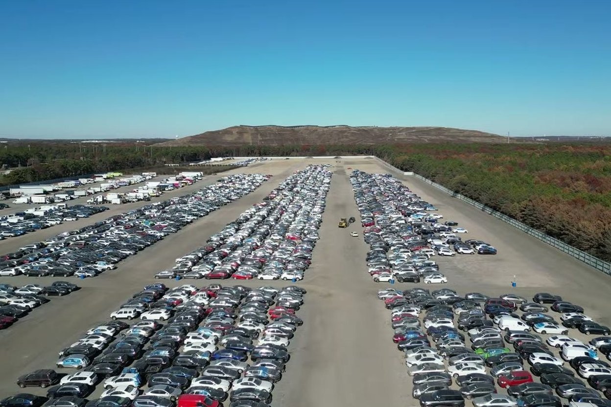 Rows of vehicles at a salvage auction yard