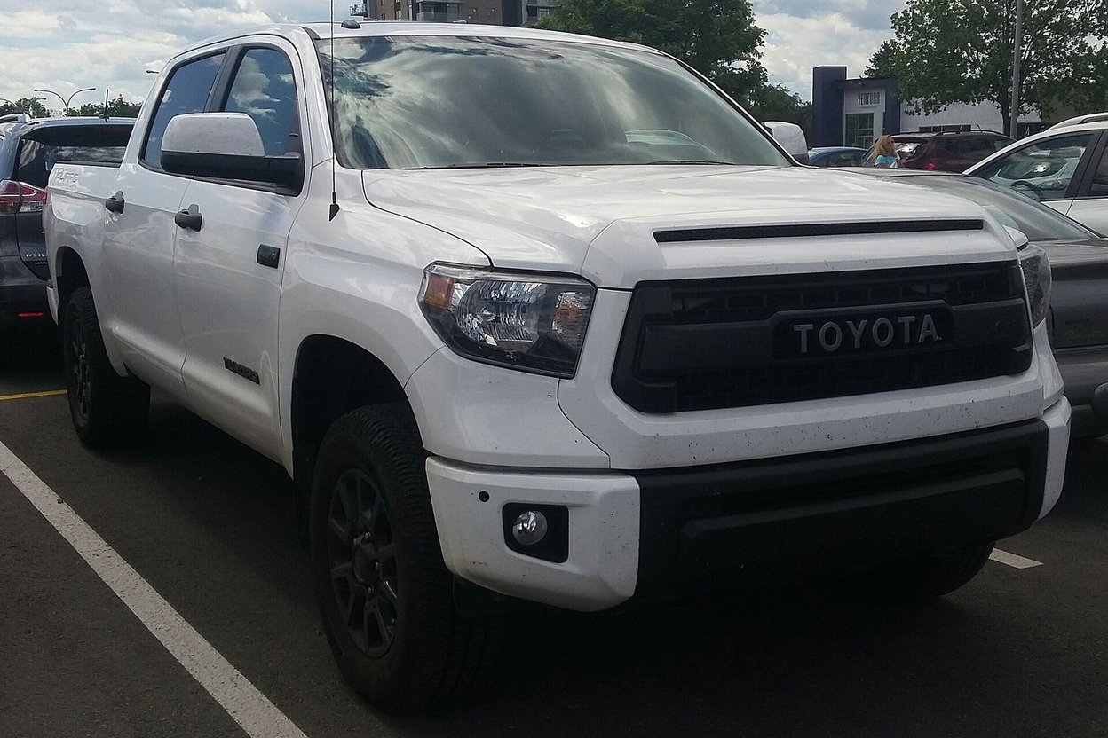 A white 2016 Toyota Tundra CrewMax pickup